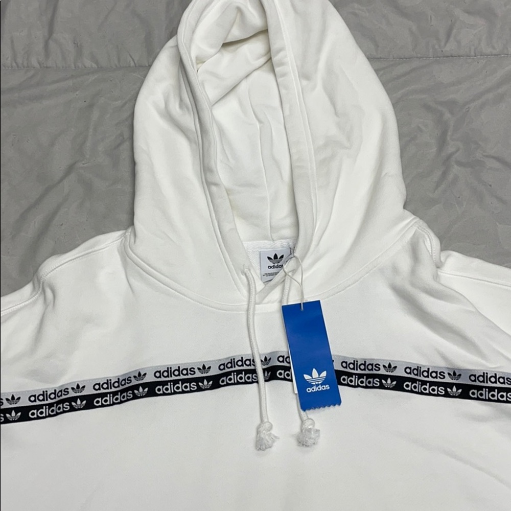 White Adidas Hoodie. New with tags.